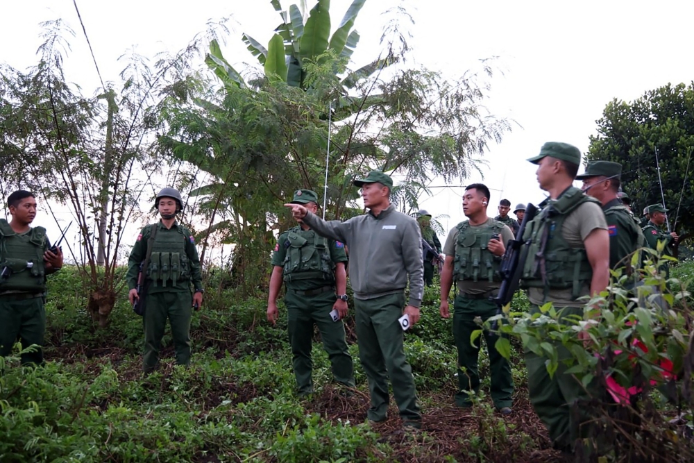 This handout photo taken and released on October 27, 2023 by the Kokang Information Network shows Myanmar National Democratic Alliance Army (MNDAA) Major General Peng Deqi (centre right) commanding operations against Myanmar's military near Lashio township in Myanmar’s northern Shan State. — AFP pic