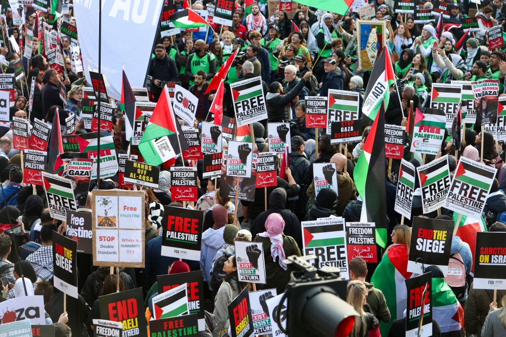 Demonstrators protest in solidarity with Palestinians in Gaza, amid the ongoing conflict between Israel and the Palestinian Islamist group Hamas, in London, Britain, October 28, 2023. — Reuters pic