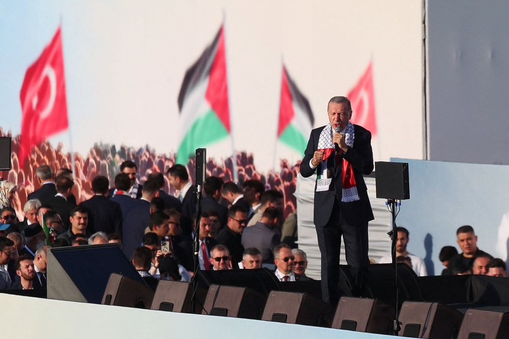 Turkish President Tayyip Erdogan speaks during a rally in solidarity with Palestinians in Gaza, amid the ongoing conflict between Israel and the Palestinian Islamist group Hamas, in Istanbul, Turkey October 28, 2023. — Reuters pic