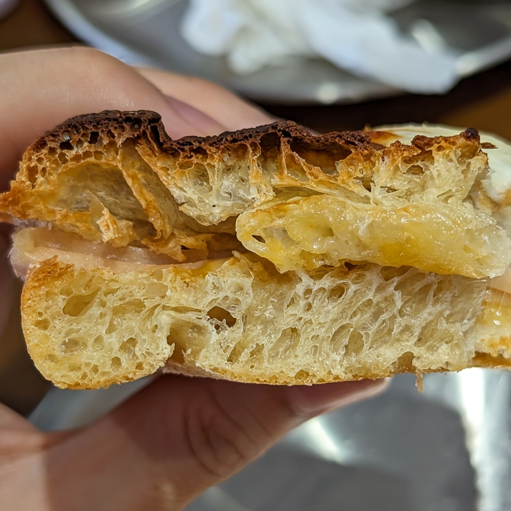 The web-like shape on the inside of the focaccia dough.