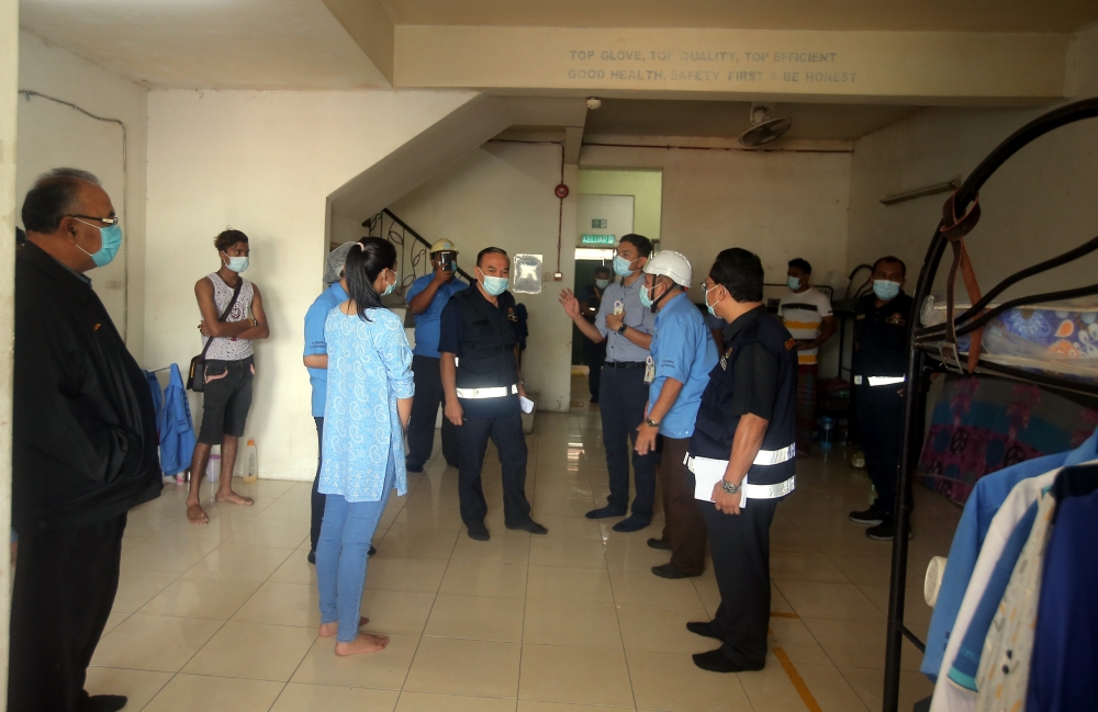 File picture of the Peninsular Labour Department conducting an operation to check the adherence of the Workers’ Minimum Standards of Housing and Amenities Act 1990 (Act 446) at a worker’s hostel in Tasek, Ipoh November 26, 2020. — Picture by Farhan Najib