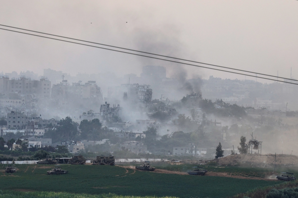 Palestinians in northern Gaza reported fierce air and artillery strikes early today as Israeli troops backed by tanks pressed into the enclave with a ground assault that drew increased international calls for the protection of civilians. — Reuters pic