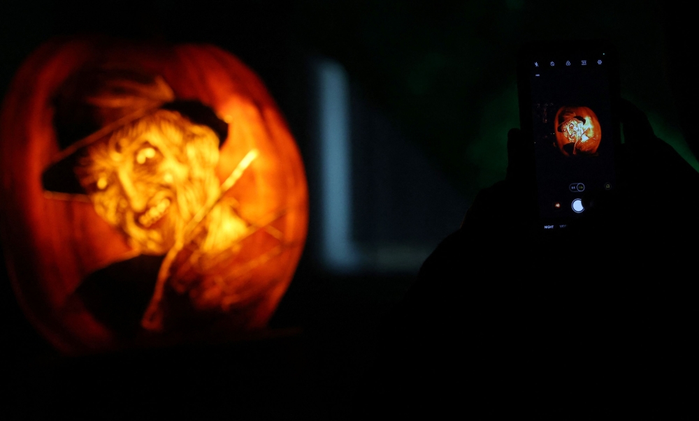 A pumpkin carved like the character of Freddy Krueger during Nights of the Jack, an immersive Halloween experience, at the King Gillette Ranch in Calabasas, California. — Reuters pic