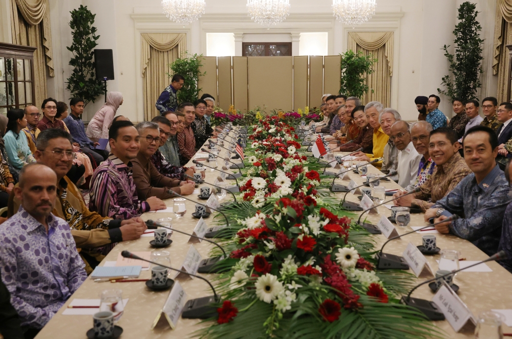 Prime Minister Datuk Seri Anwar Ibrahim (sixth from left) and his Singapore counterpart Prime Minister Lee Hsien Loong (sixth from right) during a meeting in Singapore October 30, 2023. — Bernama pic