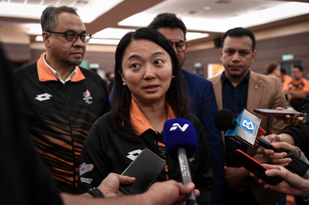 Youth and Sports Minister Hannah Yeoh speaks to reporters after the Huawei prize-presentation ceremony for the 2022 Hangzhou Asian Para Games medal winners at the National Sports Council in Bukit Jalil October 30, 2023. — Bernama pic