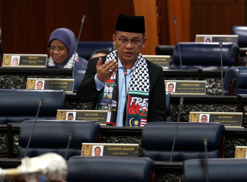 Religious Affairs Minister in the Prime Minister’s Department Datuk Mohd Na’im Mokhtar speaks at the Parliament in Kuala Lumpur October 30, 2023. — Bernama pic