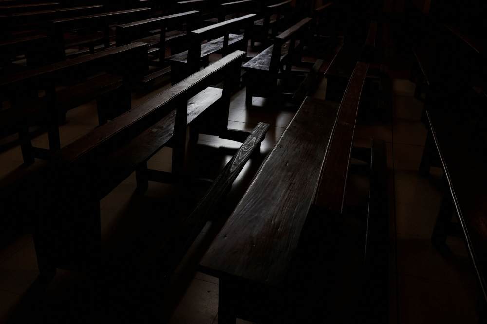 Empty pews are seen inside a Catholic church in Madrid, Spain. — Reuters pic