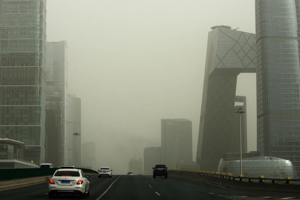 Authorities issued their highest warnings for fog and haze today as smog enveloped major cities in northern China, warning the public that visibility could drop to less than 50 metres. — Reuters pic
