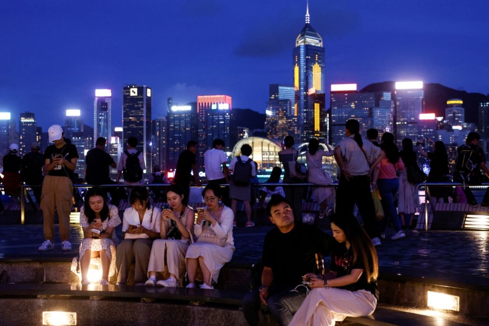 Hong Kong’s economy received a boost from returning tourists and local spending. — Reuters pic