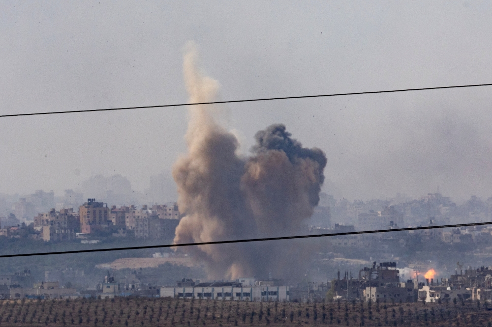 Smoke rises following an Israeli strike inside the Gaza Strip, as seen from Israel, October 31, 2023. — Reuters pic