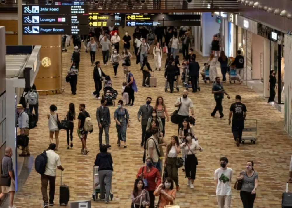 A woman and her companion tried to enter a boarding gate at Changi Airport for their flight to Amsterdam, but they were denied entry as they did not have the valid visas. — TODAY pic 