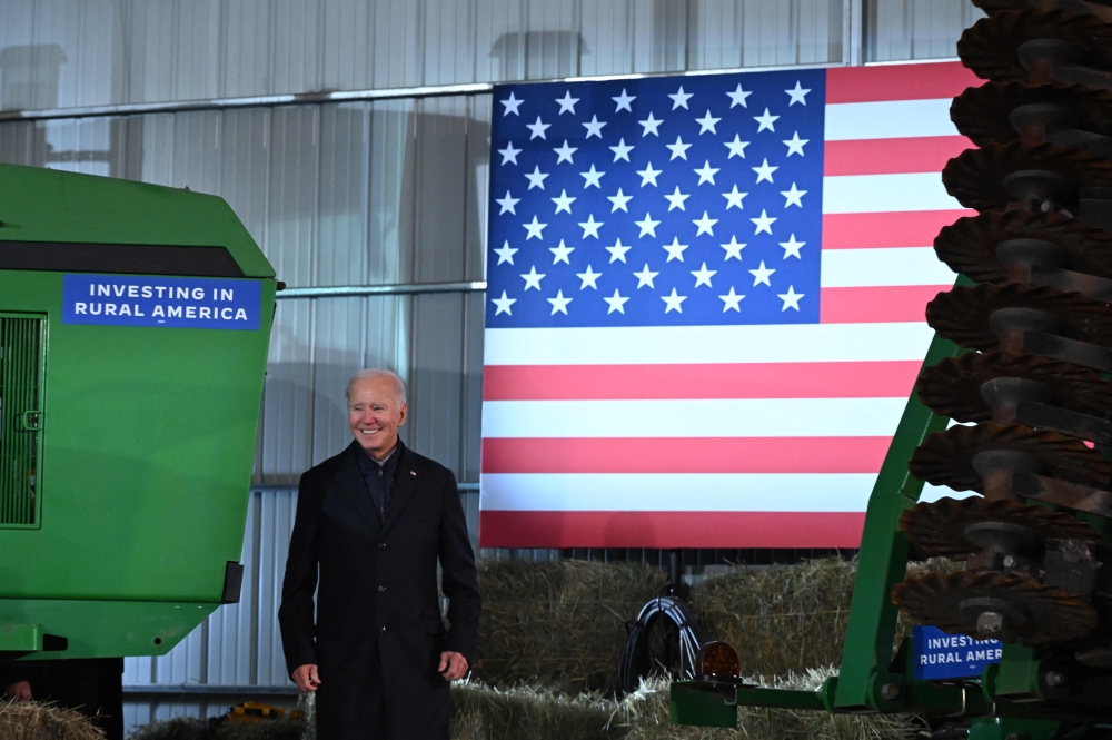 US President Joe Biden arrives to speak about his Bidenomics agenda at Dutch Creek Farms in Northfield, Minnesota, on November 1, 2023. — AFP pic