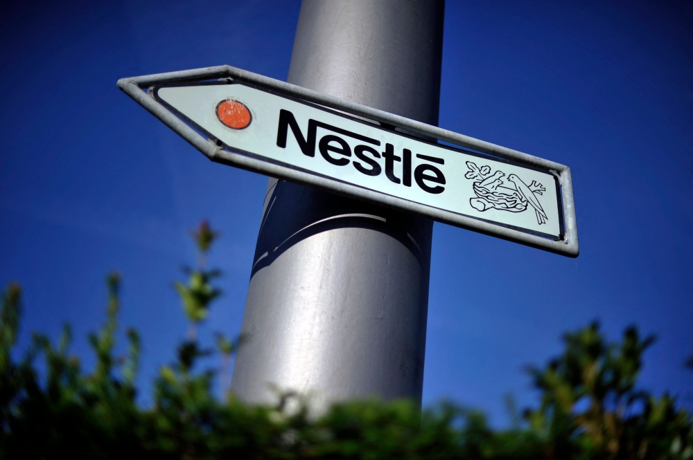 Food giant Nestle said today that it would suspend work at a French factory whose frozen pizzas were suspected to be behind deadly food poisonings in children last year. — AFP pic