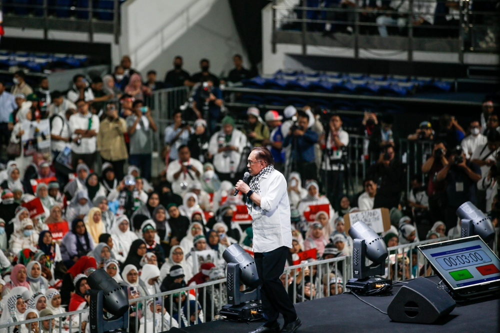 Prime Minister Datuk Seri Anwar Ibrahim speaks at the Solidarity with Palestine rally at Axiata Arena, Kuala Lumpur on October 24, 2023. — Picture by Hari Anggara