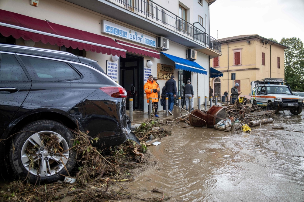 Mud and debris are seen in the street in Montemurlo, near Prato, after heavy rain last night, on November 3, 2023. Storm Ciaran hit Tuscany late on November 2, 2023 causing the death of five people according to authorities. — AFP pic