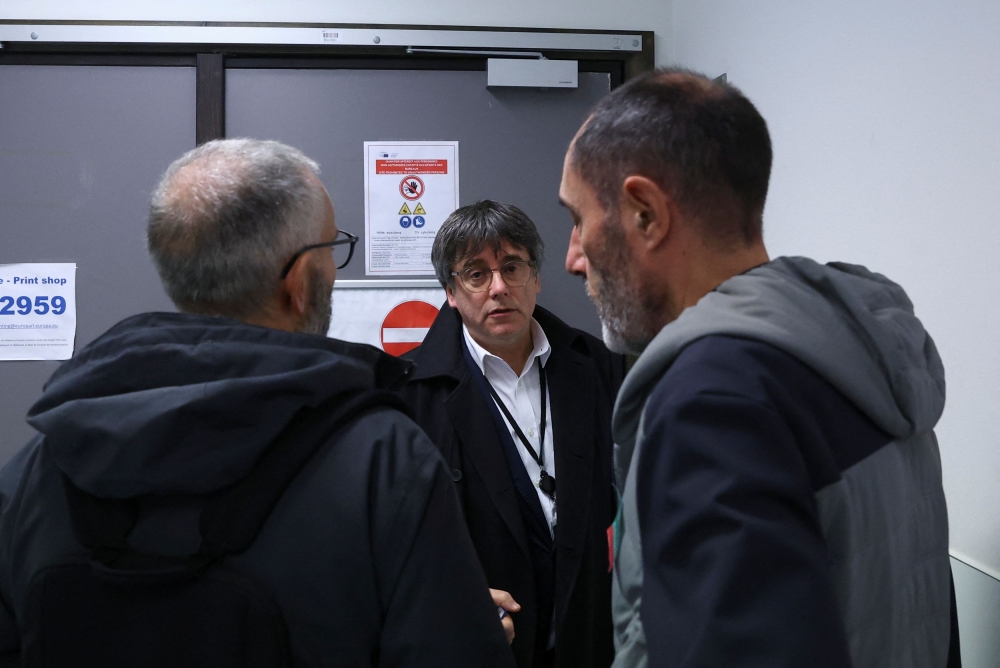 Catalan separatist leader Carles Puigdemont looks on, outside his office at the European Parliament in Brussels November 3, 2023. — Reuters pic