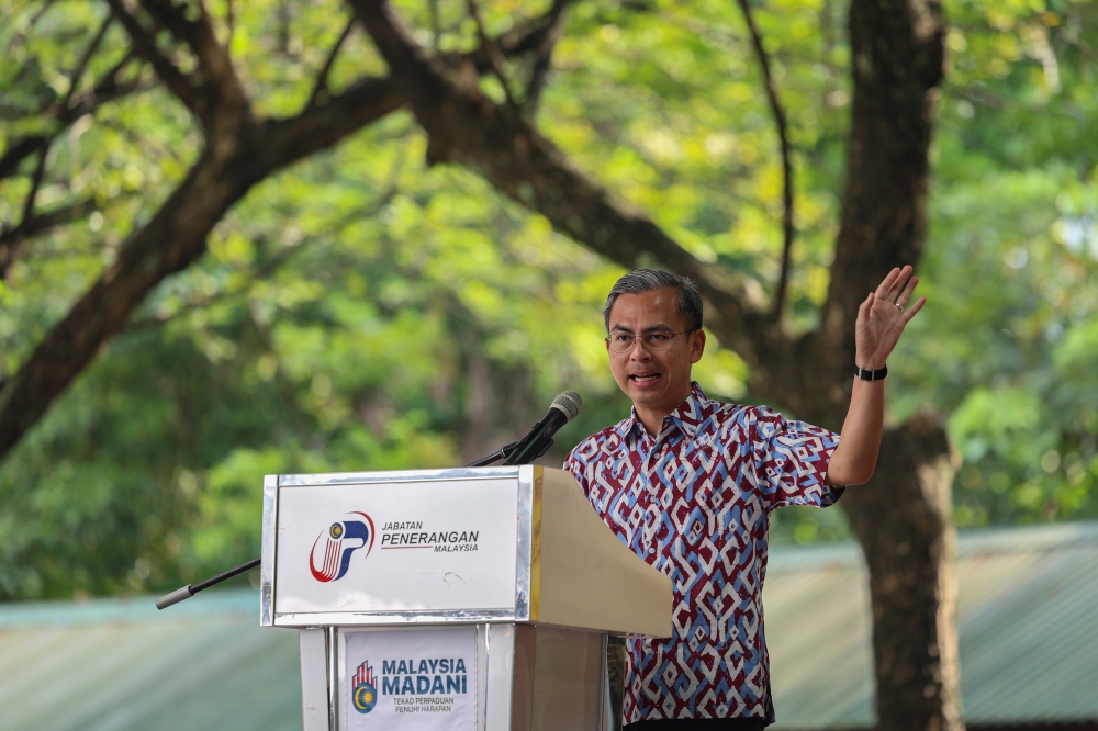 Communications and Digital Minister Fahmi Fadzi speaks during an event held to distribute Deepavali contributions to the Indian community in Lembah Pantai November 4, 2023. — Bernama pic