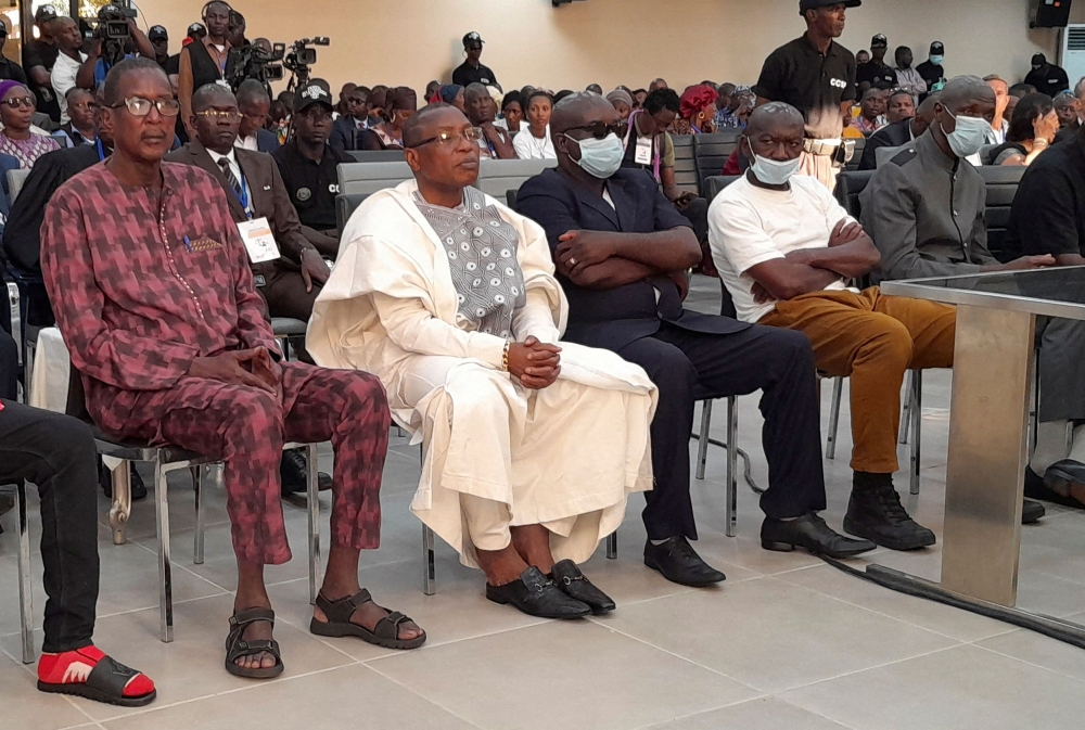 File photo of Guinea’s former military junta leader Moussa Dadis Camara and other men accused of responsibility for the 2009 massacre and mass rape of pro-democracy protesters by forces linked to a former military junta during their trial in Conakry, Guinea September 28, 2022. — Reuters pic