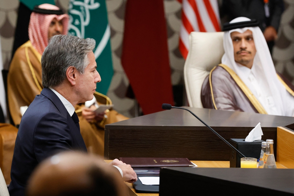 US Secretary of State Antony Blinken (left) attends a meeting with Qatar’s Prime Minister and Foreign Minister Mohammed bin Abdulrahman al-Thani, during a day of meetings about the ongoing conflict between Israel and the Palestinian Islamist group Hamas, in the Jordanian capital Amman on November 4, 2023. — AFP pic