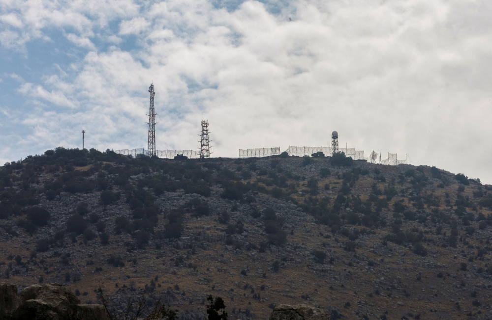 File phot of a view shows Israeli positions in the Israeli-occupied Shebaa farms as pictured from Kfarchouba, near the border with Israel, southern Lebanon, October 8, 2023. — Reuters pic