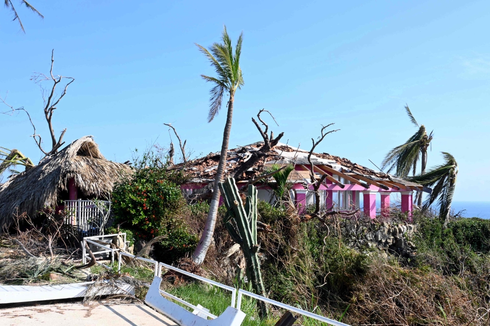 Picture of the damages caused by Hurricane Otis to the so-called Tarzan House --former residence of US actor Johny Weissmuller, famous for representing 'Tarzan' in numerous films-- located at the Los Flamingos hotel, in Acapulco, state of Guerrero, Mexico, taken on October 31, 2023. — AFP pic