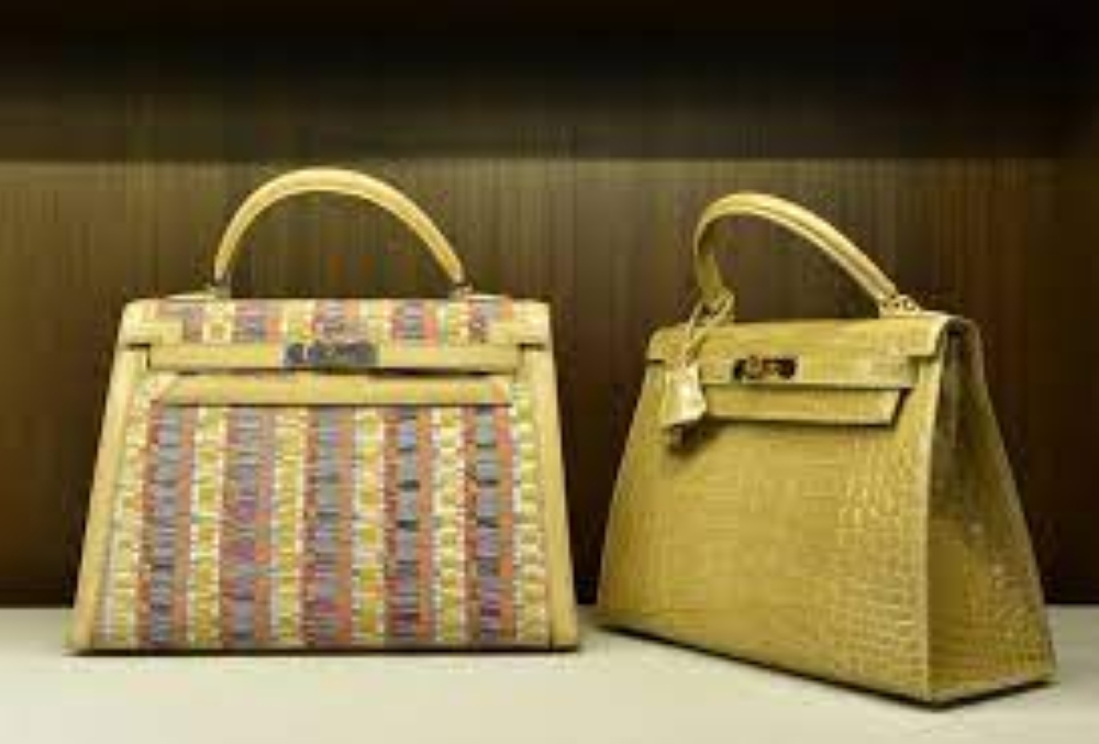 The zips found on the handbags of major brands are often made by Switzerland’s Riri, which was bought by Swiss group Oerlikon in March. —AFP pic