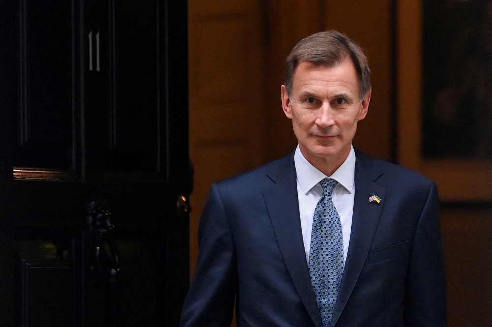 UK Finance minister Jeremy Hunt is due to give his Autumn Statement on November 22. — Reuters pic