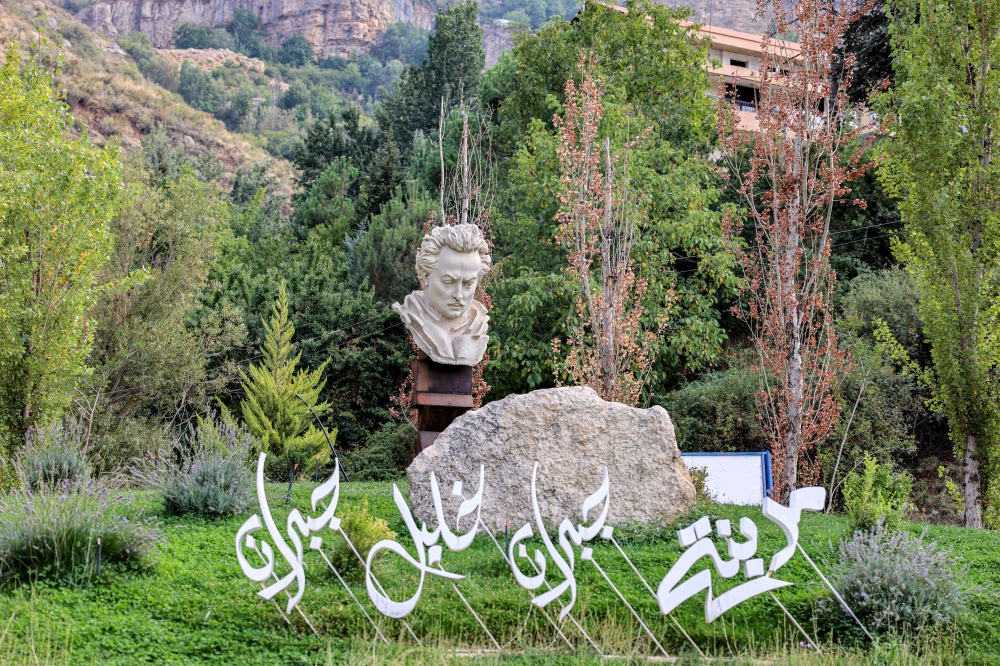 A bust sculpture depicting Lebanese-American writer, poet, and visual artist Gibran Khalil Gibran is displayed at the entrance of his hometown of Besharre (Bsharri) in northern Lebanon on October 5, 2023. — AFP pic
