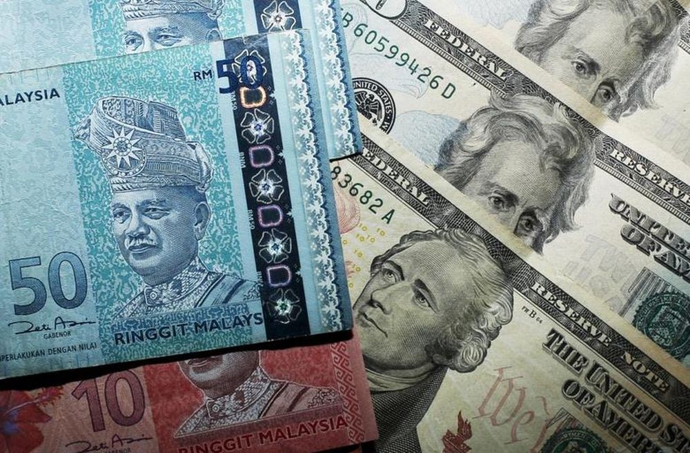 The ringgit is expected to appreciate to RM4.30 against the US dollar by year-end as the Federal Reserve (Fed) is deemed to have ended its tightening cycle for the year, said MIDF Research. — Reuters pic