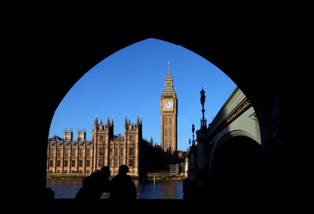 People look towards Big Ben and the Houses of Parliament, where Britain's King Charles III will set out the government's forthcoming legislative plans in a speech today, in London November 6, 2023. ― Reuters pic