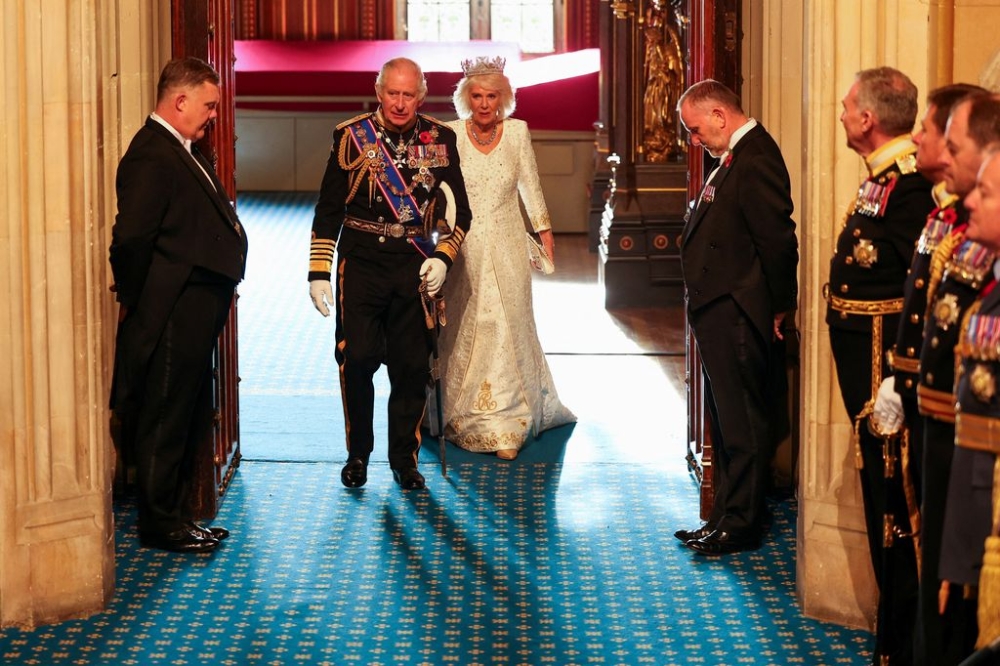Britain’s King Charles leaves with Queen Camilla after delivering a speech at the State Opening of Parliament at the Houses of Parliament in London, Britain, November 7, 2023. — Reuters pic