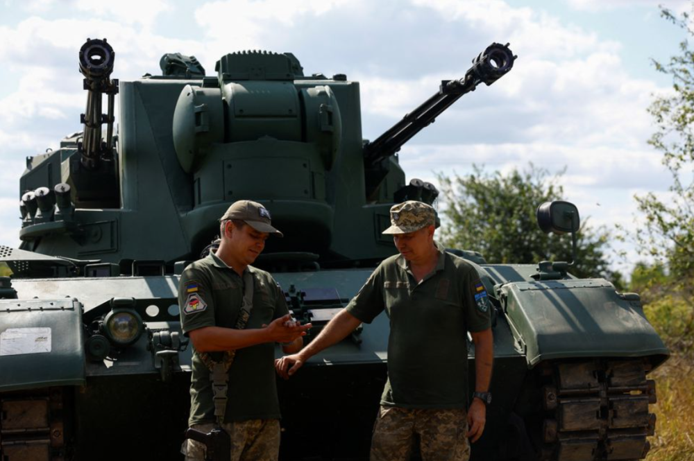 Ukrainian servicemen stand next to a Gepard self-propelled anti-aircraft gun during their combat shift, amid Russia’s attack on Ukraine, in Zhytomyr region, Ukraine September 5, 2023. — Reuters pic