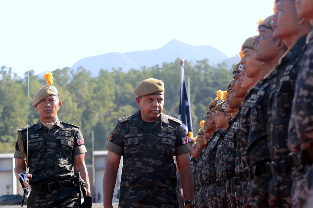 Deputy Inspector-General of Police Datuk Seri Ayob Khan Mydin Pitchay (centre) is seen during the 54th anniversary celebration of the VAT 69 Commando unit at Sultan Nazrin Shah Camp, Ulu Kinta November 8, 2023. — Bernama pic