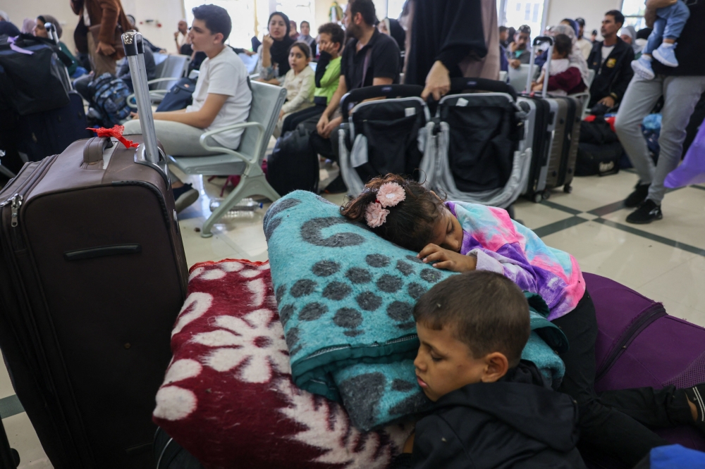 No wounded Palestinians or dual nationals were evacuated yesterday from the Gaza Strip to Egypt via the Rafah crossing, a Palestinian official said. — AFP pic