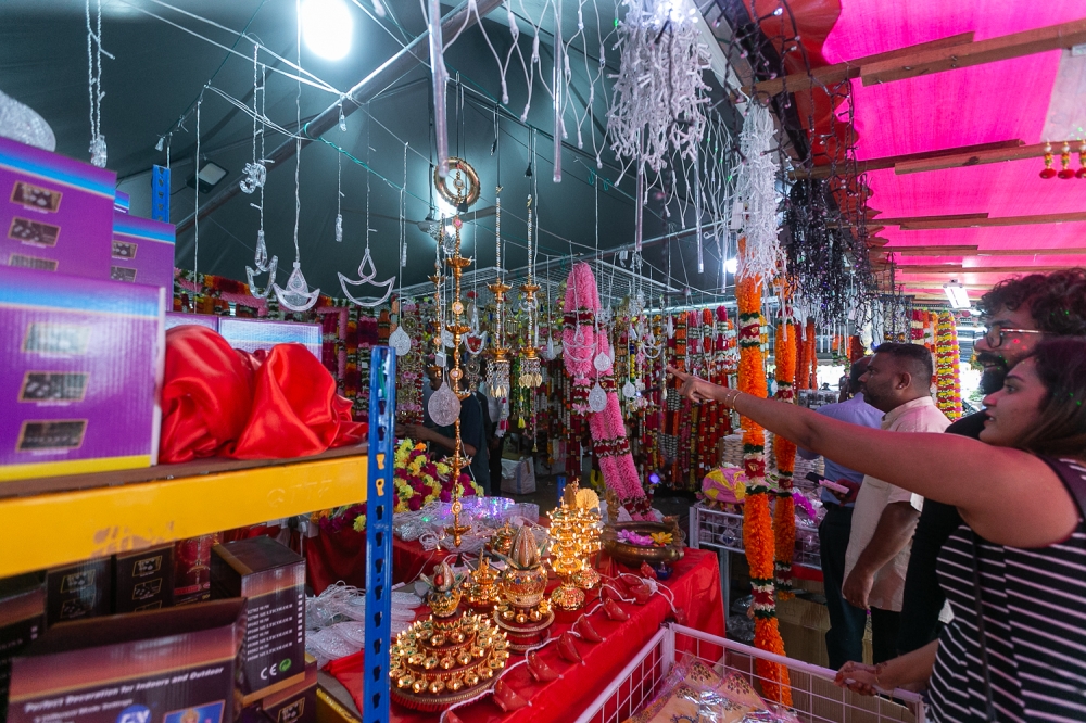 People shop for Deepavali decorations in a store in preparation for the upcoming Deepavali festival in Brickfields November 8, 2023. — Picture by Raymond Manuel