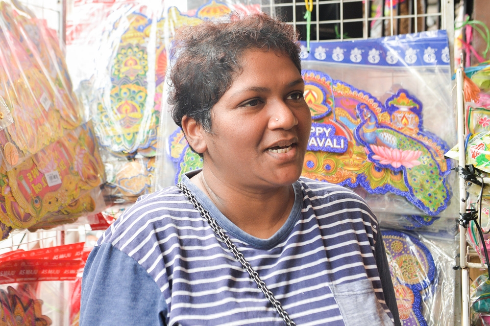 Shopper Diana speaks with Malay Mail while looking for Deepavali items in Klang November 9, 2023. — Picture by Miera Zulyana