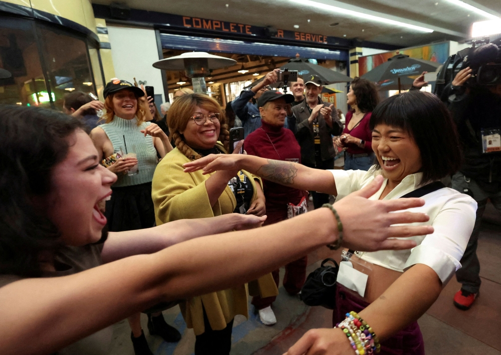 Union team captain Iris Liu reacts after the SAG-AFTRA TV/Theatrical Committee approved a tentative agreement with the Alliance of Motion Picture and Television Producers (AMPTP) to bring an end to the 118-day actors strike, at a brewery in Los Angeles, California November 8, 2023. — Reuters pic