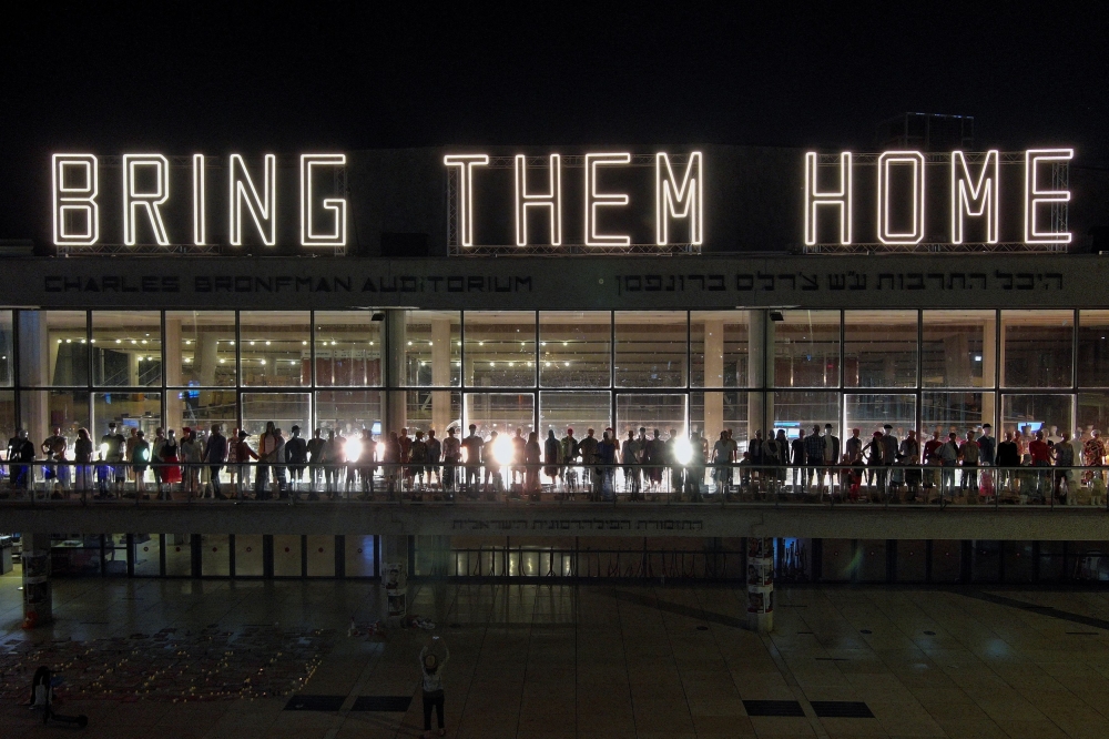 Palestinian militant group Islamic Jihad yesterday released a video it claimed showed two hostages, a woman in her 70s and a 13-year-old boy, held in Gaza. — Reuters pic