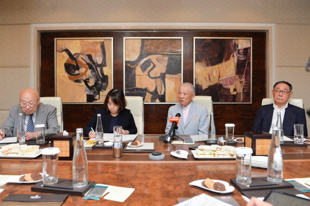 Nippon Foundation chairman Tan Sri Yohei Sasakawa (3rd right) said JMA has planted over 800,000 trees in Sarawak to date. — Picture by Miera Zulyana