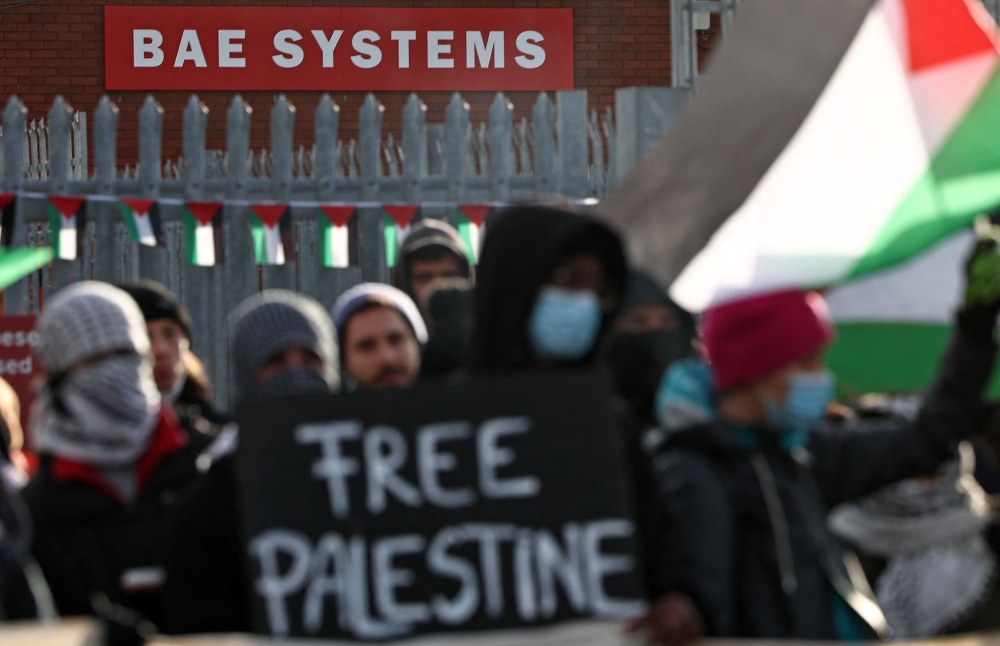 Demonstrators blockade the entrance to BAE System’s factory during a protest by ‘Workers for a Free Palestine’, calling for an end to arms sales to Israel, and supporting an immediate ceasefire between Israel and Hamas, near Rochester November 10, 2023. — AFP pic