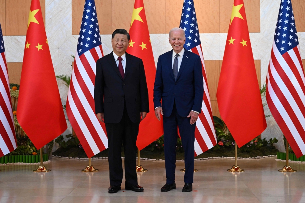 US President Joe Biden (right) and China's President Xi Jinping (left) meet on the sidelines of the G20 Summit in Nusa Dua, Bali in this file picture taken on November 14, 2022. — AFP pic