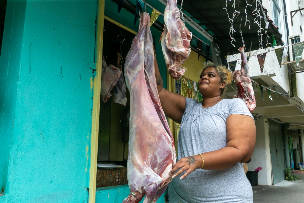 Mutton seller Prema anticipates an annual price hike for Deepavali. — Picture by Raymond Manuel