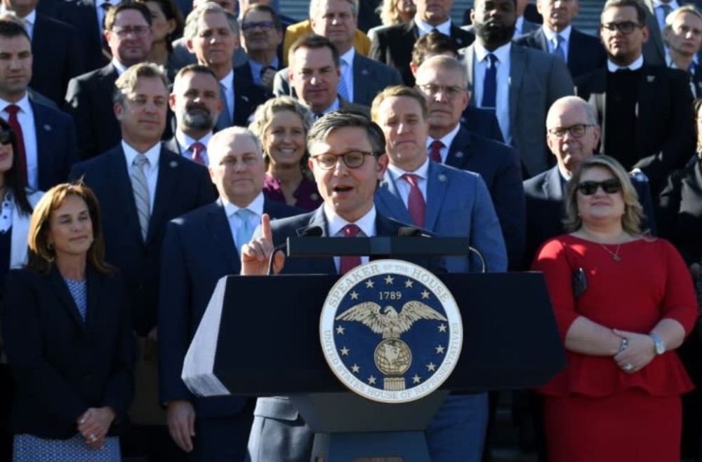 Newly elected US House Speaker Mike Johnson, shown here at a press conference in Washington in October, has made an unusual play to avoid a government shutdown. — AFP pic