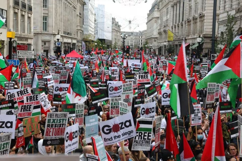 Demonstrators protest in solidarity with Palestinians, amid the ongoing conflict between Israel and the Palestinian Islamist group Hamas, in London, Britain, October 14, 2023. — Reuters pic