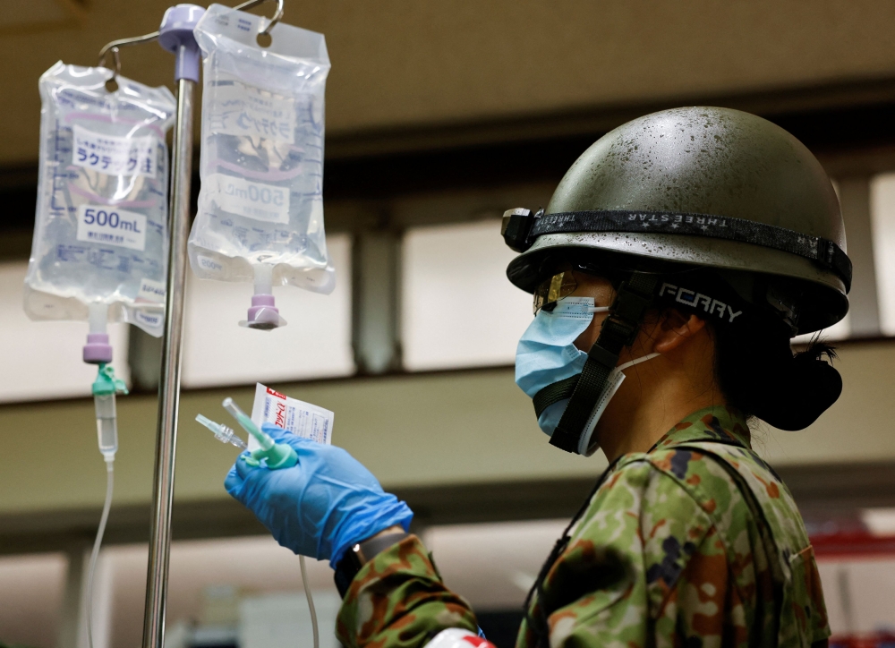 About 200 island officials and members of Japan’s military, known as the Self-Defence Force (SDF), took part in the exercise on Yonaguni, Japan’s westernmost island, 2,000 km southwest of the capital, Tokyo. — Reuters pic