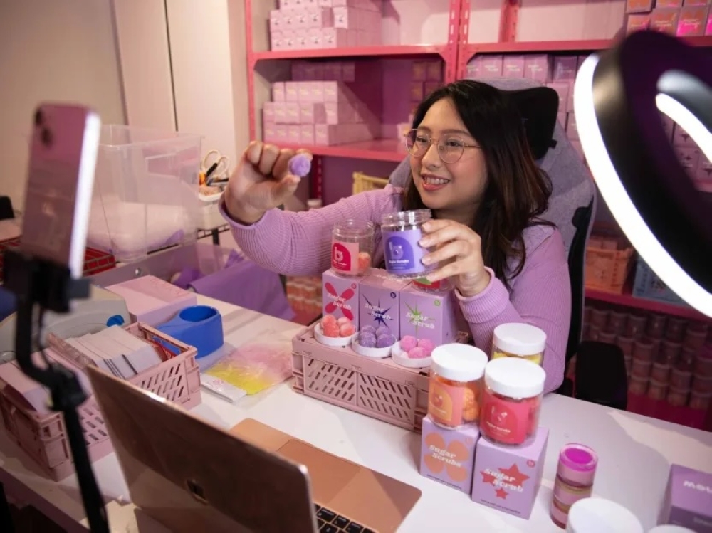 Aqilah Adnan does livestreams for her body scrubs brand Benew on both TikTok and Shopee at the same time. — TODAY pic