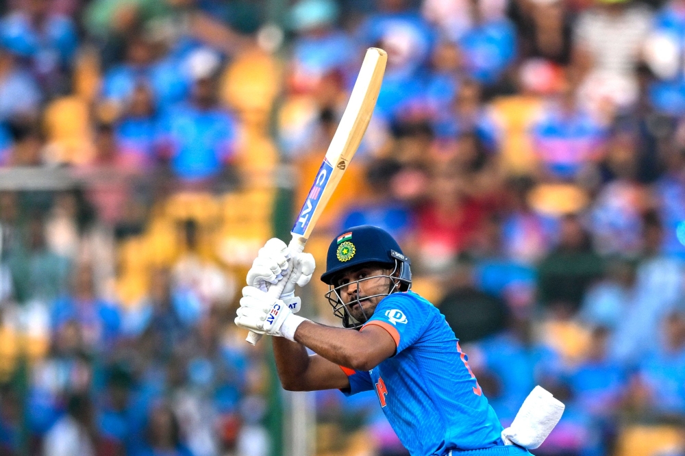 India's Shreyas Iyer plays a shot during the 2023 ICC Men's Cricket World Cup one-day international (ODI) match between India and Netherlands at the M. Chinnaswamy Stadium in Bengaluru November 12, 2023. — AFP pic