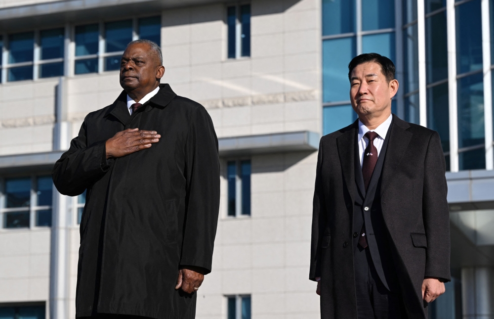 US Secretary of Defense Lloyd Austin and South Korean Defence Minister Shin Won-sik attend a welcome ceremony before their annual security meeting at the Defence Ministry in Seoul, South Korea on November 13. — Reuters pic