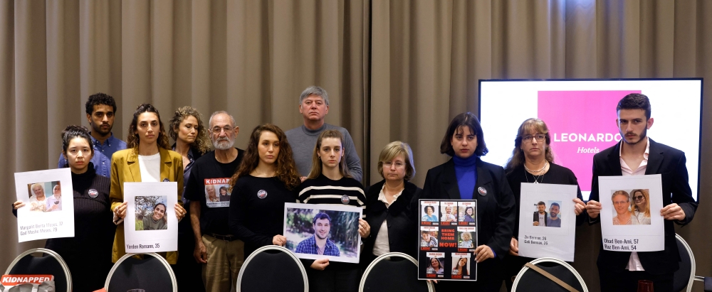 Hamas’ military wing yesterday accused Israel of delaying over a prospective Qatar-mediated deal to release dozens of hostages they are holding in Gaza, as part of a prisoner swap scheme. — AFP pic