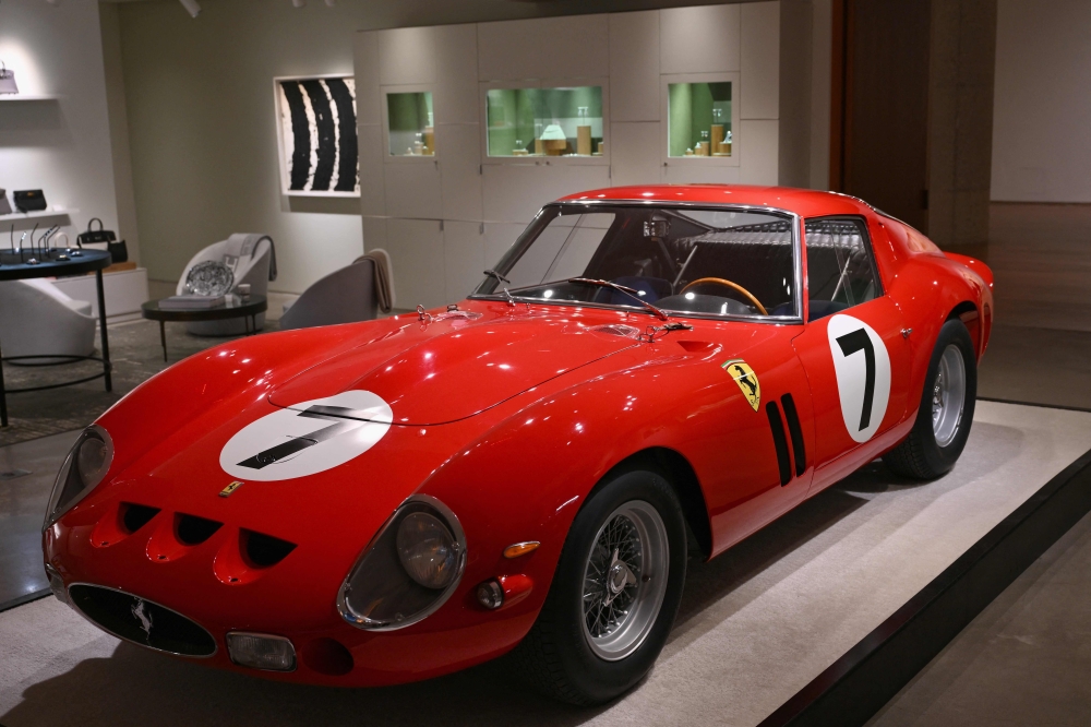 A 1962 Ferrari 250 GTO, the most valuable car ever offered at auction, is displayed during a preview at Sotheby’s in New York on November 2, 2023. ― AFP pic